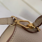 Handle and strap detail of statement everyday-luxe women's handbag – women's designer-style accessory