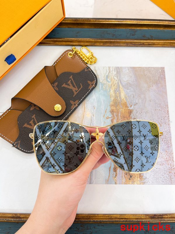 Close-up detail view of Louis Vuitton unisex sunglasses
