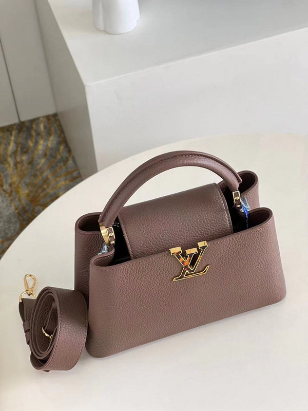 Side profile of structured statement women's handbag – women's everyday handbag