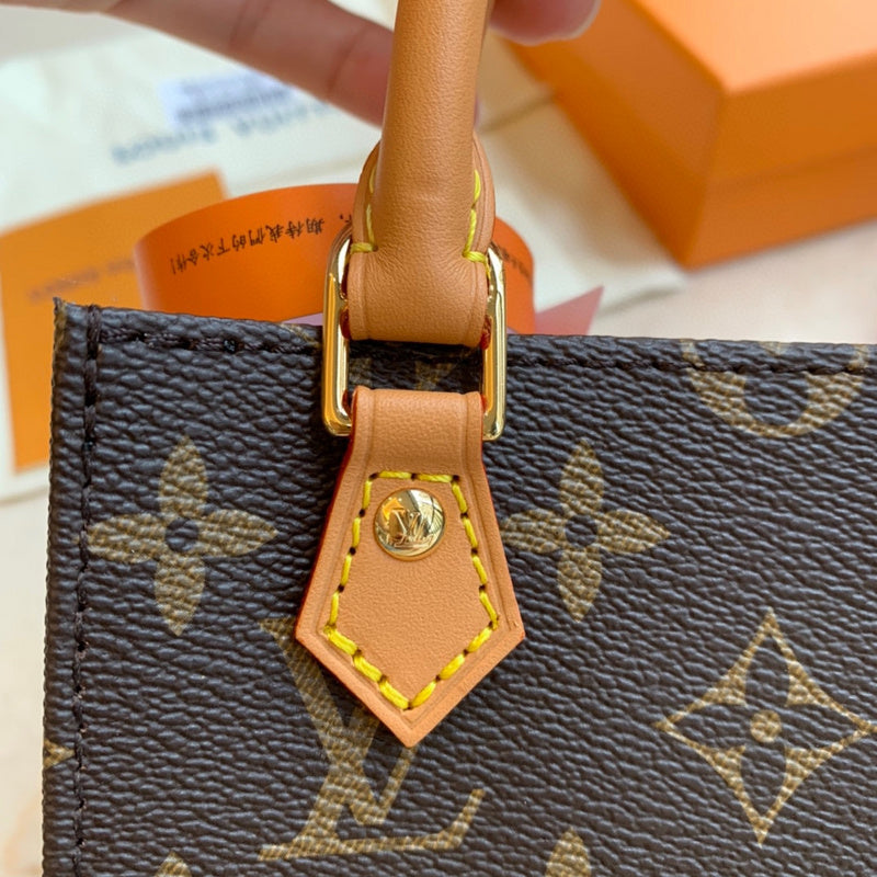 Styled lifestyle shot of sleek polished women's handbag – women's premium purse