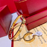 Angled view of Cartier unisex jewelry piece