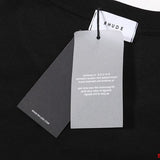 Front view of Rhude luxury clothing with label-forward styling