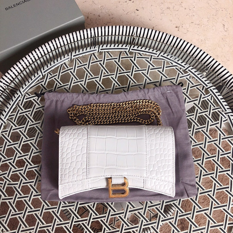 Front view of chic polished women's handbag – women's statement bag
