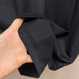 Back view of Givenchy luxury clothing with everyday silhouette