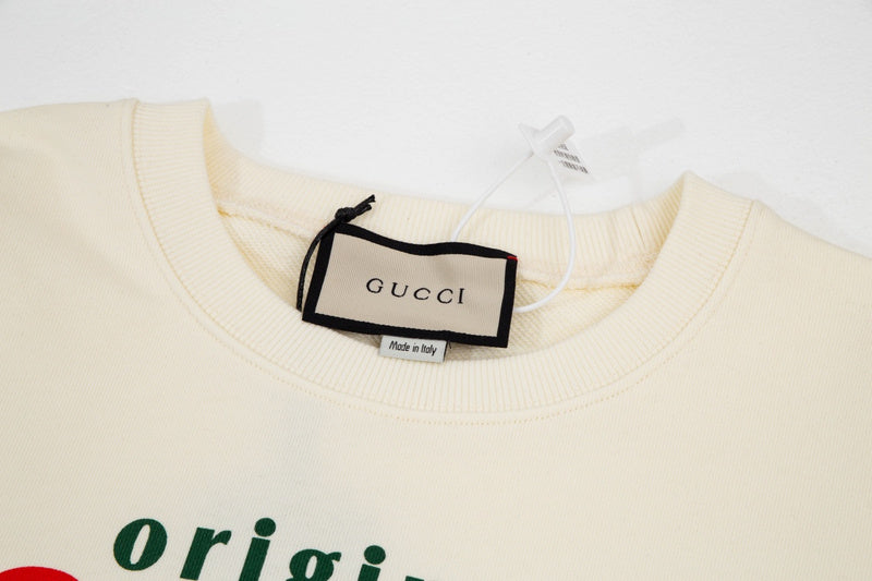 Close-up detail shot of Gucci luxury clothing with contemporary cut