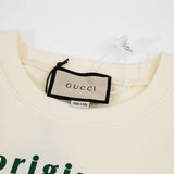 Close-up detail shot of Gucci luxury clothing with contemporary cut