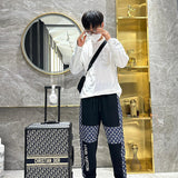 Flat lay presentation of Louis Vuitton luxury clothing with contemporary cut