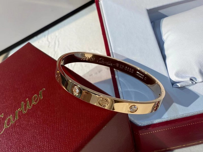 Side view of Cartier unisex jewelry piece