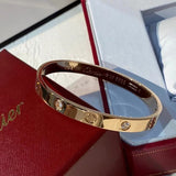 Side view of Cartier unisex jewelry piece