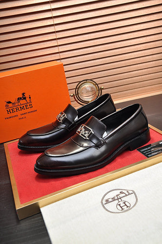 Hermes shoes Style 057 - front view, iconic logo design