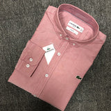 Side profile of Lacoste luxury clothing with logo-detail design