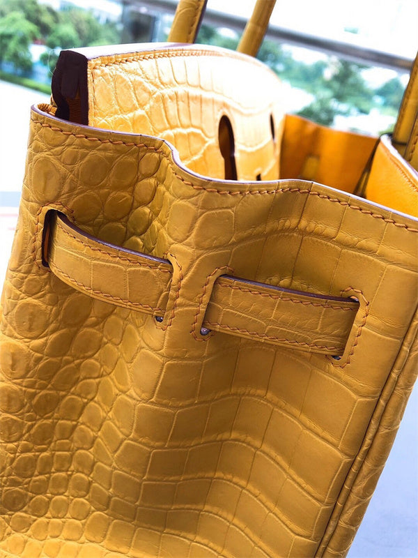 Side view of poised structured handbag