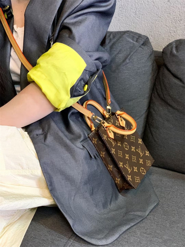  Signature satchel carried on shoulder 10
