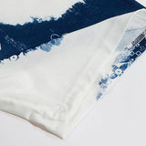 Flat lay presentation of Louis Vuitton cotton t-shirt with runway-inspired design