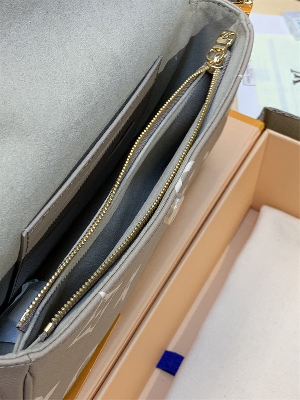  crossbody bag close-up of hardware and finish 23