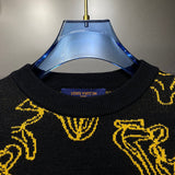 Flat lay presentation of Louis Vuitton luxury clothing with runway-inspired design