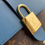 Back view of sleek structured women's handbag – women's statement bag