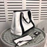 Top view of modern statement women's handbag – women's luxury handbag