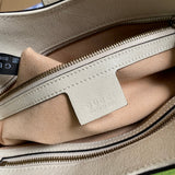 Side profile of sleek statement women's handbag – women's everyday handbag