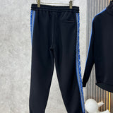 Close-up detail shot of Louis Vuitton luxury clothing with runway-inspired design