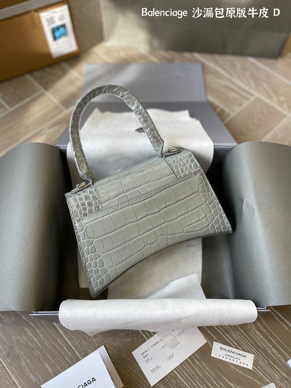 Ziva's Charm handbag – styled view (one versatile size)
