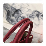 Side view of chic structured handbag