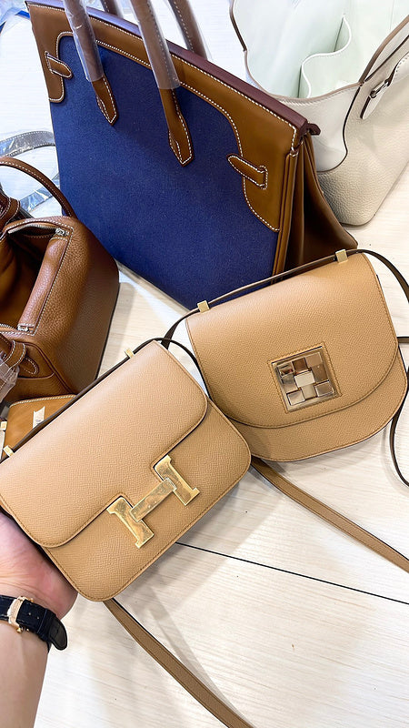 Side view of classic structured handbag
