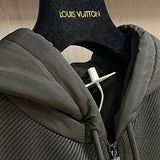 Close-up detail shot of Louis Vuitton luxury clothing with monogram-inspired silhouette