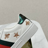 Side profile of Gucci soft grey sneakers bold athletic profile