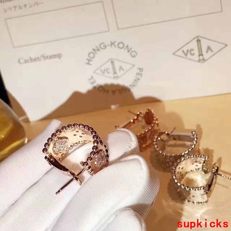 Lifestyle view of Van Cleef & Arpels unisex jewelry piece