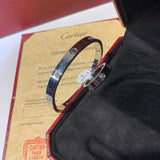 Side view of Cartier unisex jewelry piece