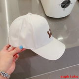 Side view of Louis Vuitton unisex cap