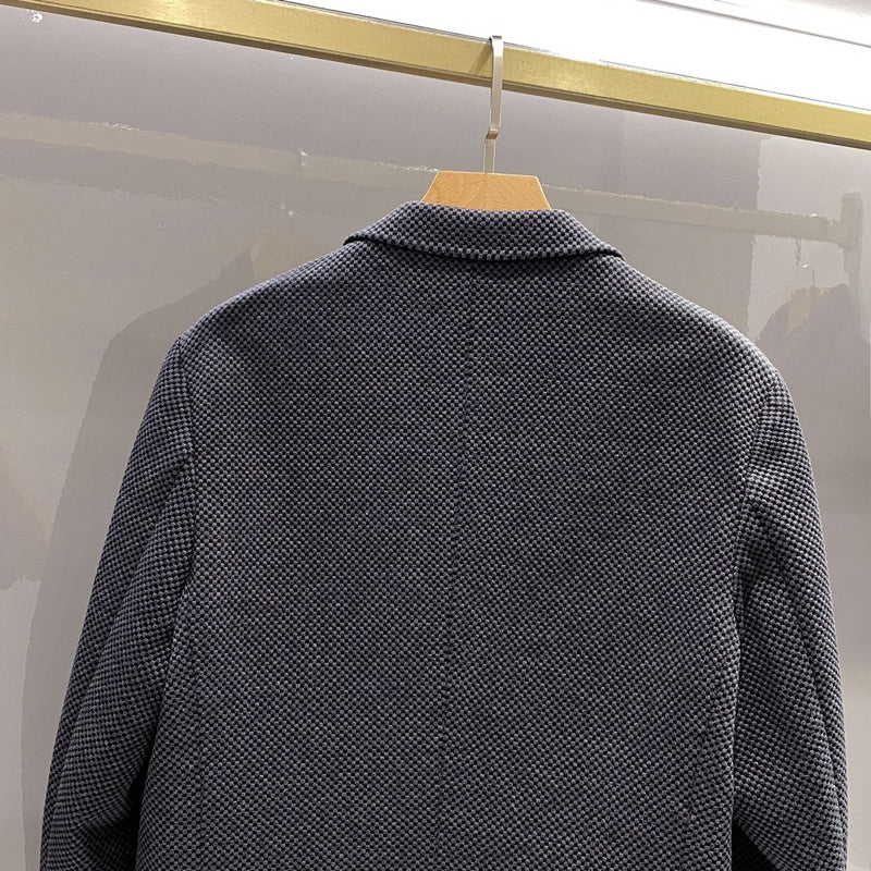 Close-up detail shot of Louis Vuitton luxury clothing with relaxed-fit cut