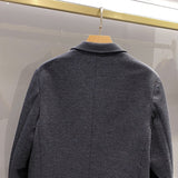 Close-up detail shot of Louis Vuitton luxury clothing with relaxed-fit cut