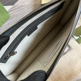 Close-up detail of elevated polished women's handbag – women's statement bag