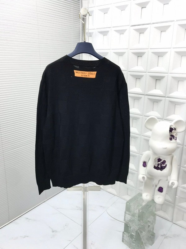 Back view of Louis Vuitton luxury clothing with signature branding
