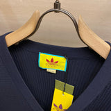 Close-up detail shot of Gucci luxury clothing with label-forward styling
