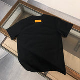 Close-up detail shot of Louis Vuitton cotton t-shirt with streetwear-inspired cut