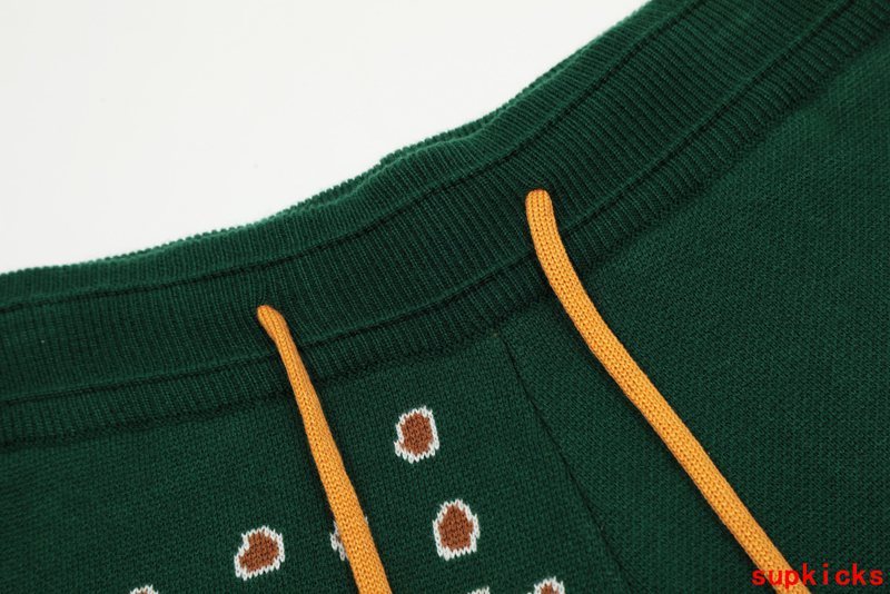 Close-up detail shot of Rhude luxury clothing with label-forward styling