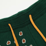 Close-up detail shot of Rhude luxury clothing with label-forward styling