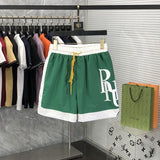 Front view of Rhude luxury clothing with label-forward styling