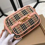 Ziva's Charm handbag – side angle view (one versatile size)