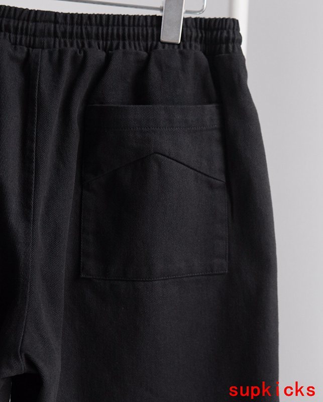 Front view of Rhude luxury clothing with everyday silhouette