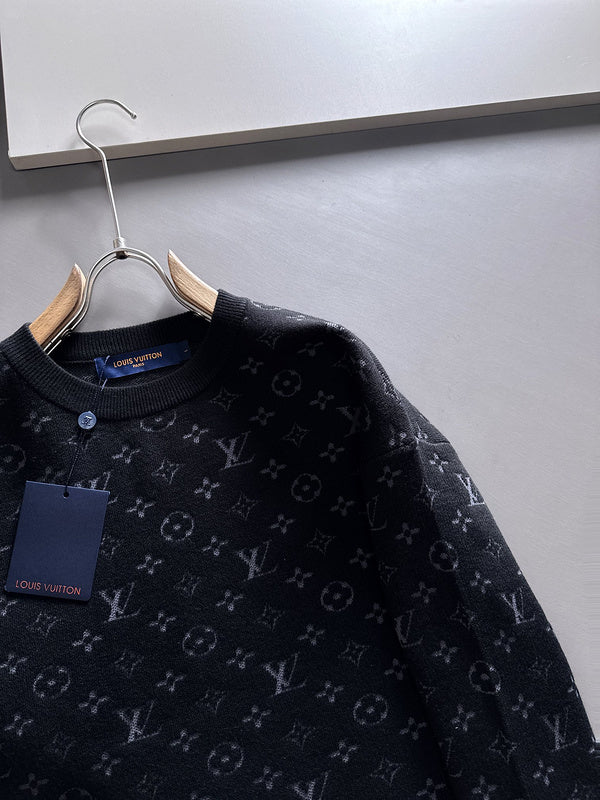 Flat lay presentation of Louis Vuitton luxury clothing with logo-detail design