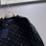 Flat lay presentation of Louis Vuitton luxury clothing with logo-detail design