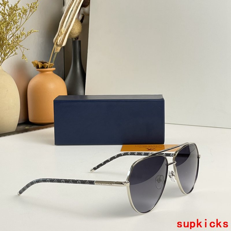 Close-up detail view of Louis Vuitton unisex sunglasses