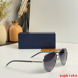 Close-up detail view of Louis Vuitton unisex sunglasses