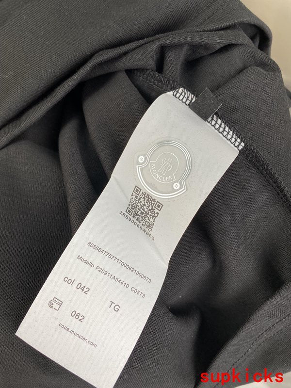 Close-up detail shot of Moncler luxury clothing with relaxed-fit cut