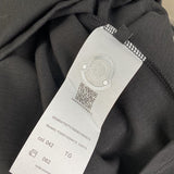 Close-up detail shot of Moncler luxury clothing with relaxed-fit cut
