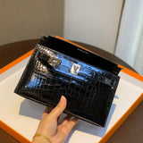 Side view of clean-lined structured handbag